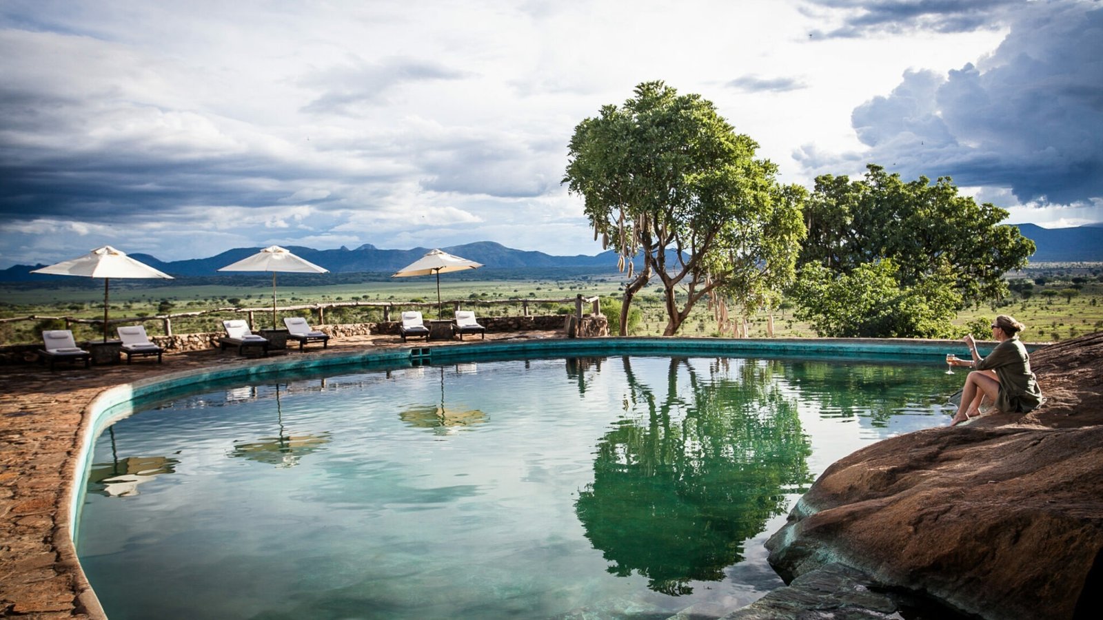 Tourist resting in Kidepo Valley National Park at Apoka Safari Lodge