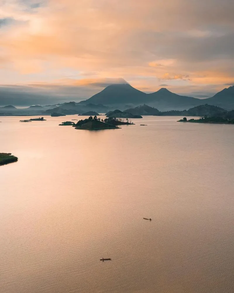 View of Lake Mutanda with hills and muhabura mountains