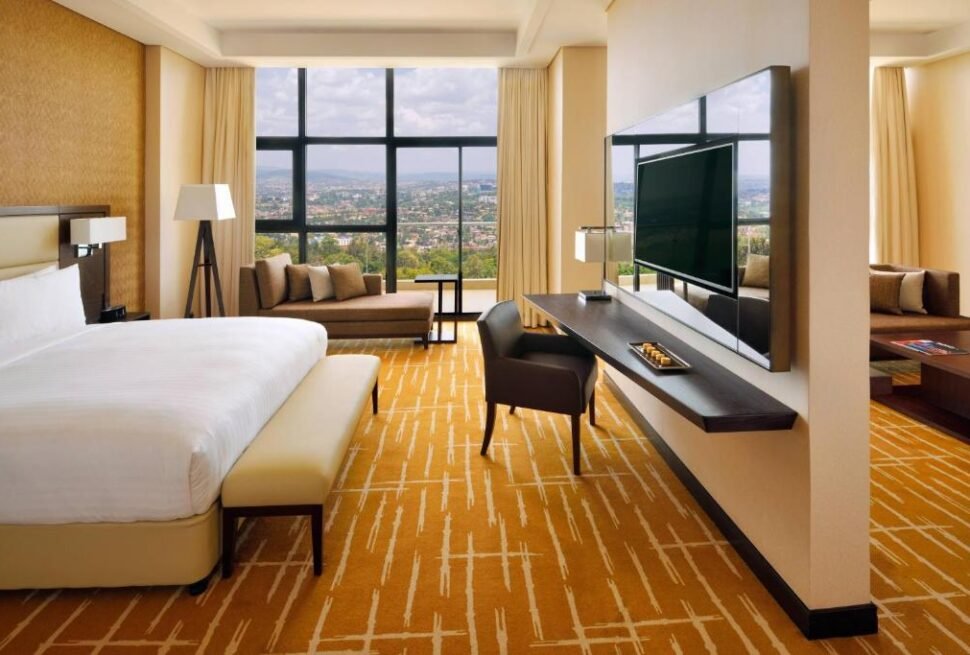 Luxurious hotel room interior at Kigali Marriott Hotel with elegant furnishings and city view