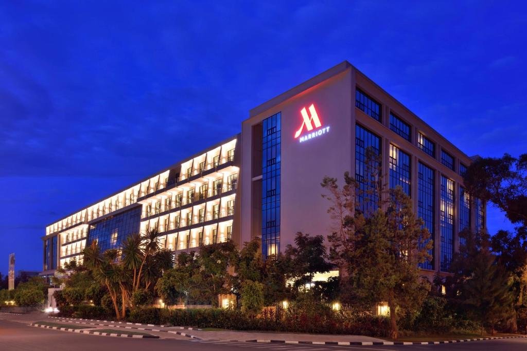 Kigali Marriott Hotel exterior showcasing modern design and greenery