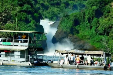 Wide-angle view of a safari boat on the Victoria Nile below Murchison Falls.