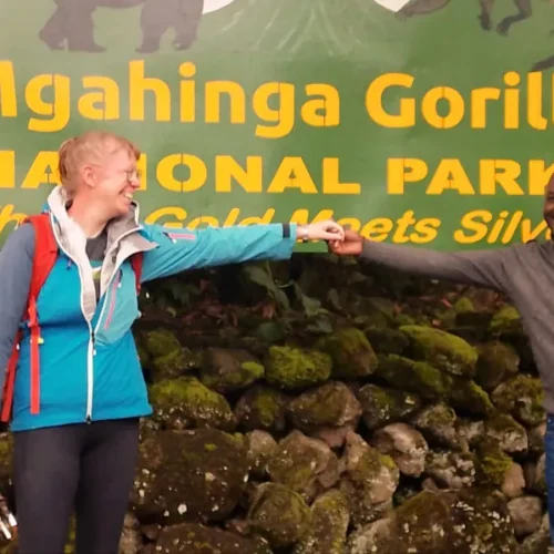 Tourist with Nturo Safaris tour guide in Mgahinga NP