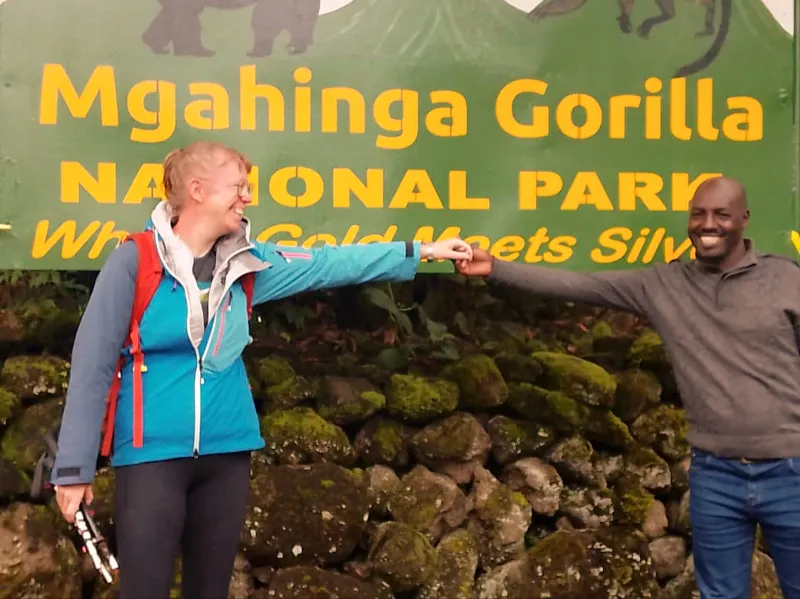 Tourist with Nturo Safaris tour guide in Mgahinga NP