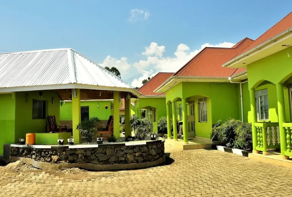 Iliba Guest House exterior surrounded by trees