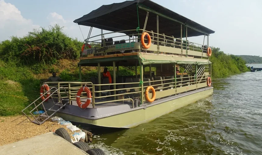 Boat safaris in Kazinga offer close views of wildlife along the water’s edge.
